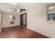 Bonus room featuring red concrete flooring and natural light at 4158 E Crescent Ave, Mesa, AZ 85206