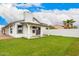 Spacious backyard with lush grass and a covered patio, perfect for outdoor living and entertaining at 4319 E Contessa St, Mesa, AZ 85205