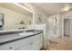 Bright bathroom featuring a large vanity, shower-tub combination at 5303 N 7Th St # 118, Phoenix, AZ 85014