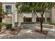 Inviting courtyard with bench seating, lush landscaping, and direct access to residential buildings at 5303 N 7Th St # 118, Phoenix, AZ 85014