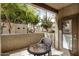 Balcony with outdoor seating and views of mature trees at 5303 N 7Th St # 118, Phoenix, AZ 85014