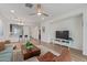 Open concept living room with modern decor and seamless flow to the kitchen at 5312 W Hardtack Trl, Laveen, AZ 85339