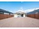 Cozy backyard with sliding glass door, patio and a low-maintenance desert-style landscape at 576 N Pasadena --, Mesa, AZ 85201