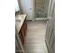 Well-lit bathroom featuring modern flooring, vanity with sink, toilet and shower at 5901 E Leonora St, Mesa, AZ 85215