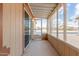 Covered patio with sliding doors, a screen and views of the neighborhood at 5901 E Leonora St, Mesa, AZ 85215