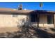 Backyard with covered patio and view of mature shade tree, offering outdoor living space at 6231 W Zoe Ella Way, Glendale, AZ 85306