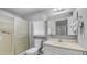 This bathroom features a shower, a toilet, and a vanity at 8103 E Southern Ave # 205, Mesa, AZ 85209