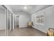 Bright bedroom featuring vaulted ceilings, wood-look flooring, and a large window at 8103 E Southern Ave # 205, Mesa, AZ 85209