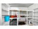 Organized storage with white shelving offering ample space for tools and accessories at 8103 E Southern Ave # 205, Mesa, AZ 85209