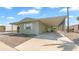 A charming single-story home with a covered carport and low-maintenance landscaping at 8103 E Southern Ave # 268, Mesa, AZ 85209