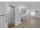 Bright laundry room features a stackable washer/dryer, tile floor, and an enclosed toilet for convenience at 8103 E Southern Ave # 268, Mesa, AZ 85209