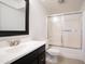 Clean bathroom with a shower-tub combo, modern vanity, and neutral tones at 8827 N New World Dr, Glendale, AZ 85302