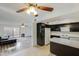 Open concept living space seamlessly connects the kitchen and living room at 8827 N New World Dr, Glendale, AZ 85302