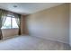 Neutral bedroom with carpet, a window with curtains, and plenty of natural light at 9843 E Acacia Dr, Scottsdale, AZ 85260