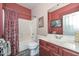 Cozy bathroom featuring a shower-tub combo, and single vanity with plenty of counter space at 15953 W Custer Ln, Surprise, AZ 85379