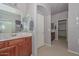 Spacious bathroom with double vanity, large mirror and separate shower at 15953 W Custer Ln, Surprise, AZ 85379