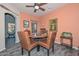 Dining room featuring a decorative table, with seating for four, and stylish furnishings at 15953 W Custer Ln, Surprise, AZ 85379