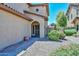 Inviting front entrance featuring manicured desert landscaping and a stylish security door at 15953 W Custer Ln, Surprise, AZ 85379