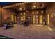 Inviting covered patio with brick flooring, cozy seating, and stylish decor for outdoor relaxation at 1607 W Pearce Rd, Phoenix, AZ 85041