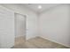 Clean, carpeted bedroom with white walls and doors, offering a simple, modern aesthetic at 17761 W Getty Dr, Goodyear, AZ 85338