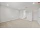 Spacious bedroom with carpeting, ensuite bathroom, and walk-in closet access at 17761 W Getty Dr, Goodyear, AZ 85338
