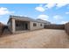 New backyard with a covered patio and clear views at 17776 W Getty Dr, Goodyear, AZ 85338