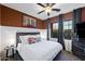 Inviting bedroom with neutral tones, cozy bedding, and a ceiling fan for added comfort at 1829 N Atwood --, Mesa, AZ 85207