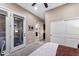 Bedroom with glass doors, a walk-in closet, and a view into the hall at 1829 N Atwood --, Mesa, AZ 85207