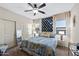 Nicely decorated bedroom with a colorful record collection, neutral walls, and ample natural light at 1829 N Atwood --, Mesa, AZ 85207