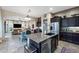 Open-concept kitchen with granite counters, stainless steel appliances, and a seamless flow to the living spaces at 1829 N Atwood --, Mesa, AZ 85207