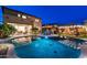 Enjoy the stunning pool and outdoor living areas, complete with a dining area, pergola, and exterior building at 1829 N Atwood --, Mesa, AZ 85207