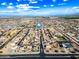 Aerial shot features a residential area, highlighting a house with a pin drop icon, surrounded by streets and neighboring homes at 1849 S 225Th Dr, Buckeye, AZ 85326