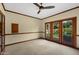 Bedroom with a ceiling fan, carpet flooring, and beautiful windows at 1905 N Calle Maderas --, Mesa, AZ 85213