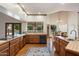 Kitchen with a long countertop and views of the pool and patio area through large windows and glass doors at 1905 N Calle Maderas --, Mesa, AZ 85213