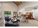 Open-concept living room with high ceilings, access to outdoor space and convenient access to kitchen at 1905 N Calle Maderas --, Mesa, AZ 85213