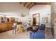 Spacious living room showcasing a stone fireplace, comfortable seating, and seamless flow to other areas at 1905 N Calle Maderas --, Mesa, AZ 85213