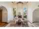 Spacious living room featuring a fireplace, high ceilings, and an open floor plan at 1905 N Calle Maderas --, Mesa, AZ 85213