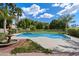 Inviting pool area with a classic fountain adds charm to this backyard at 1905 N Calle Maderas --, Mesa, AZ 85213