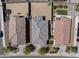 Bird's-eye view of houses showcasing the backyard sizes and roof styles in a well-maintained neighborhood at 19984 W Washington St, Buckeye, AZ 85326