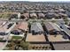 Aerial view showcasing real estate homes in a meticulously planned community with mountain views at 19984 W Washington St, Buckeye, AZ 85326