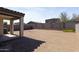 The backyard is a blank canvas, ready for your landscaping dreams at 19984 W Washington St, Buckeye, AZ 85326