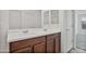 Bathroom with dual sinks and mirrors at 19984 W Washington St, Buckeye, AZ 85326