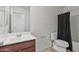 Bathroom vanity and commode with shower and tub in the background at 19984 W Washington St, Buckeye, AZ 85326