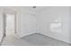 Bedroom with ensuite and closet, carpeted in neutral tones with natural light from window at 19984 W Washington St, Buckeye, AZ 85326