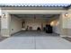 Spacious garage with an open door; perfect for storage at 19984 W Washington St, Buckeye, AZ 85326