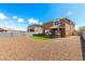 Large backyard with low maintenance landscaping at 20116 W Monroe St, Buckeye, AZ 85326