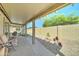Spacious backyard with a covered patio, landscaping, and a well-manicured lawn at 2101 S Meridian Rd # 146, Apache Junction, AZ 85120