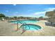 Community pool with a hot tub, a pool, plenty of seating, and ladders into the pools in this common community space at 2101 S Meridian Rd # 146, Apache Junction, AZ 85120