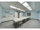 Inviting craft room with ample storage, a large work table, and bright, natural light at 2101 S Meridian Rd # 146, Apache Junction, AZ 85120