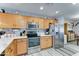 Well-lit kitchen boasting stainless steel appliances, ample cabinet space, and a modern tile backsplash at 2101 S Meridian Rd # 146, Apache Junction, AZ 85120